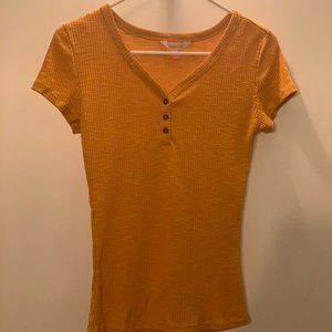 orange/yellow button up t-shirt